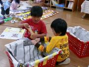 もうすぐ完成　「ここもってて」「いいよ」